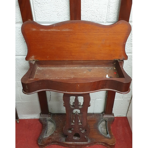 175 - A 19th Century Mahogany Hall Stand with a serpentine top. W 68 x D 32 x H 207 cm approx.