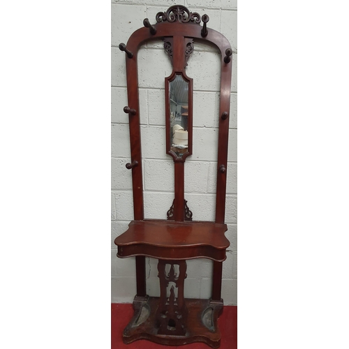 175 - A 19th Century Mahogany Hall Stand with a serpentine top. W 68 x D 32 x H 207 cm approx.