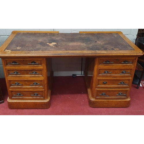 251 - Of superb quality. A really good unusual 19th Century Oak Pedestal Desk with a bank of drawers flank... 