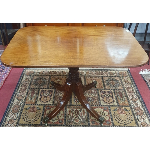 275 - A 19th Century Mahogany rectangular Supper Table on quatrefoil base and brass castors. 69 x 107 x H ... 