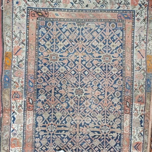 281 - A Persian red and cream ground Rug. 124 x 190 cm approx.