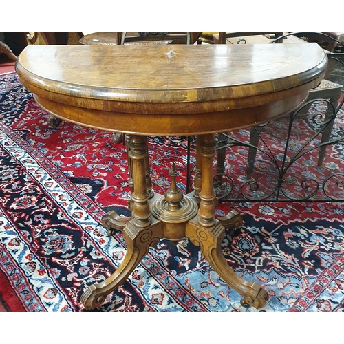 329 - A 19th Century Walnut, Veneered and Inlaid half moon foldover Card Table. The table having floral in... 