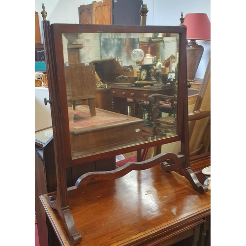 340 - A Mahogany Crutch Mirror with bevelled glass. W 54 x H 65 cm approx.