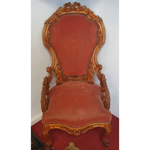 352 - A good 19th Century Walnut Armchair with highly carved outline on carved cabriole supports. W 53 x S... 