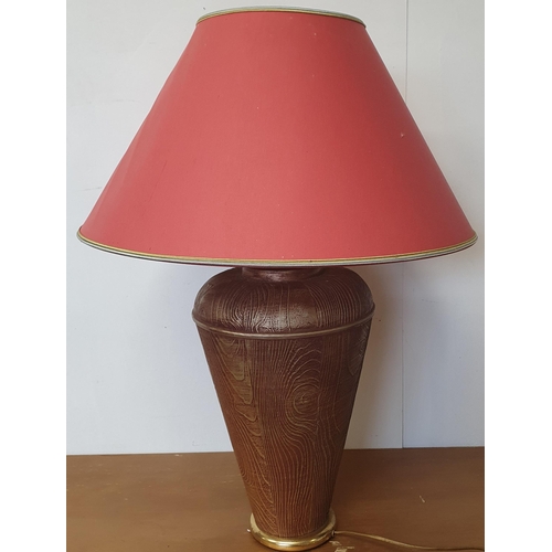 359 - An unusual timber effect Table Lamp of bulbous form. H 47 cm approx.