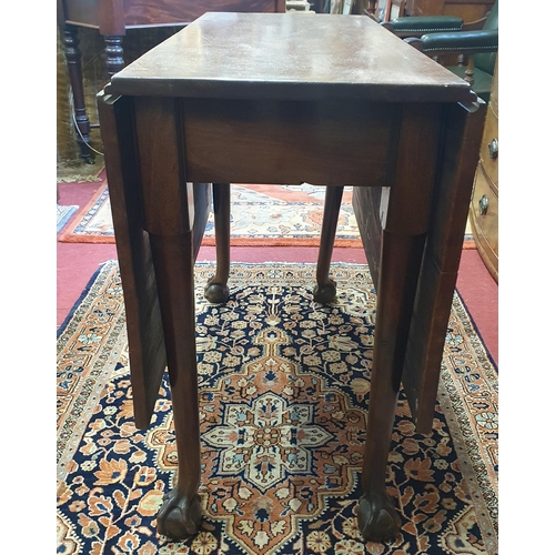 376 - A Georgian Mahogany miniature dropleaf Table with carved ball and claw supports. 90 x 123 x H 70 cm ... 