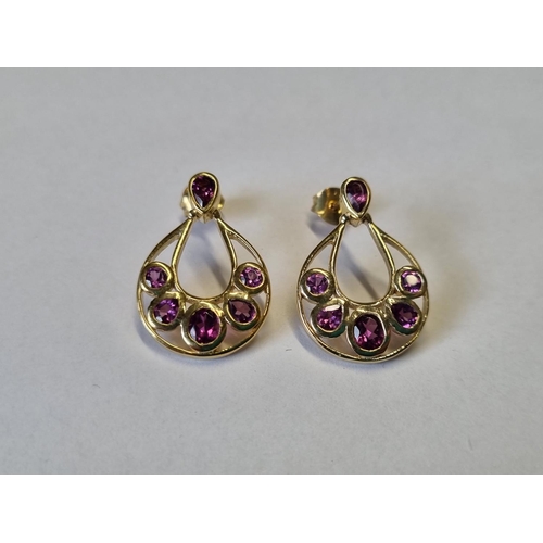 767 - A pair of Silver gem set Earrings.