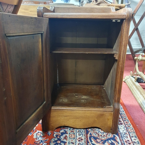 843 - A late 19th Century Walnut single door Cupboard with highly carved door. W 36 x 34 x H 59 cm approx.