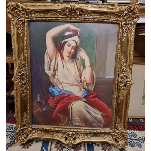 935 - A large Oleograph of a Classical Picture of a beautiful Woman in a highly ornate Gilt Frame. Height ... 