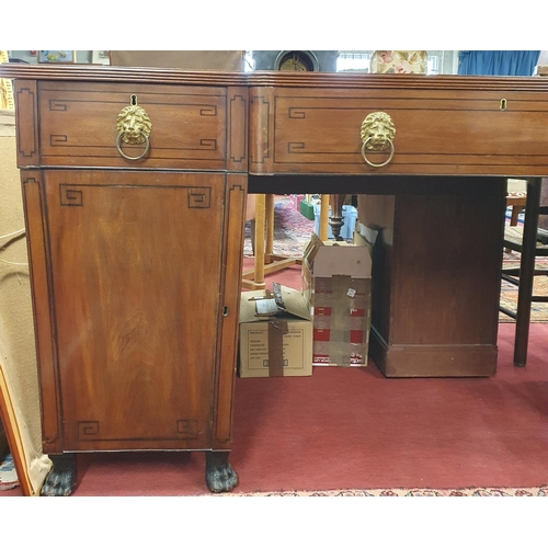 979 - Of Superb quality. An early Regency Mahogany and Inlaid Pedestal Sideboard with ebony stringing, lio... 