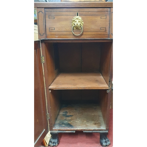 979 - Of Superb quality. An early Regency Mahogany and Inlaid Pedestal Sideboard with ebony stringing, lio... 