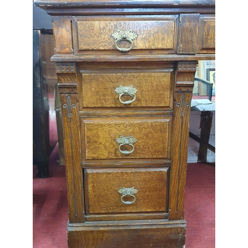 988 - A good modern Oak Pedestal Desk with brass ring handles and triple leather tooled top. 132 x 56 x H ... 