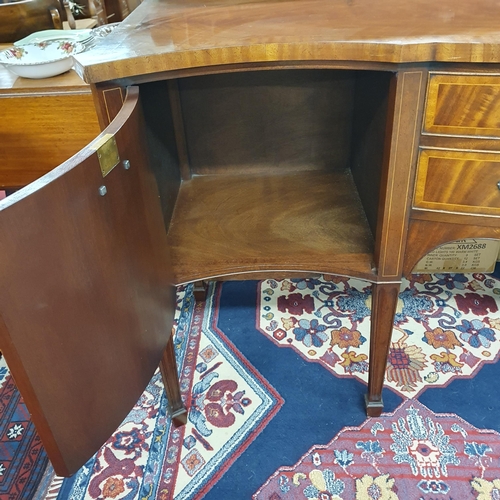 1058 - Of Superb quality. A 20th Century Mahogany Serpentine fronted Sideboard with highly inlaid outline w... 