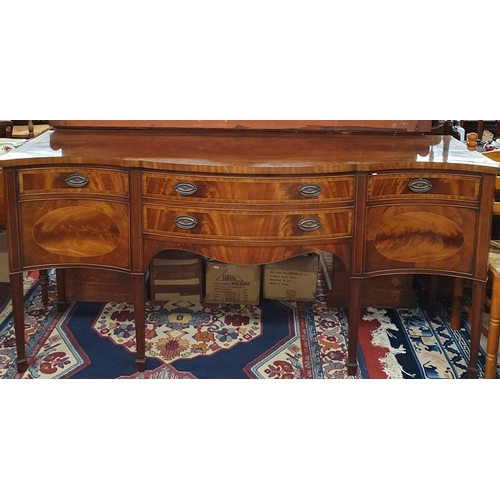 1058 - Of Superb quality. A 20th Century Mahogany Serpentine fronted Sideboard with highly inlaid outline w... 