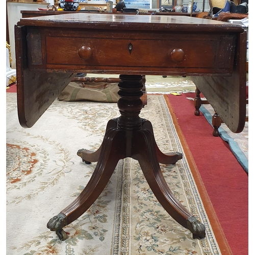 1094 - An early 19th Century Pembroke Table on quatrefoil base and turned shaft with single frieze drawer. ... 