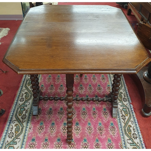 1112 - A 19th Century Walnut Sutherland Table on turned bobbin supports. 64 x 77 x H 62 cm approx.