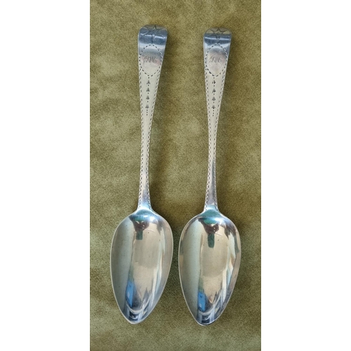 933 - A good pair of bright cut Irish Silver serving Spoons, James Keating 1811. 122 gms approx.