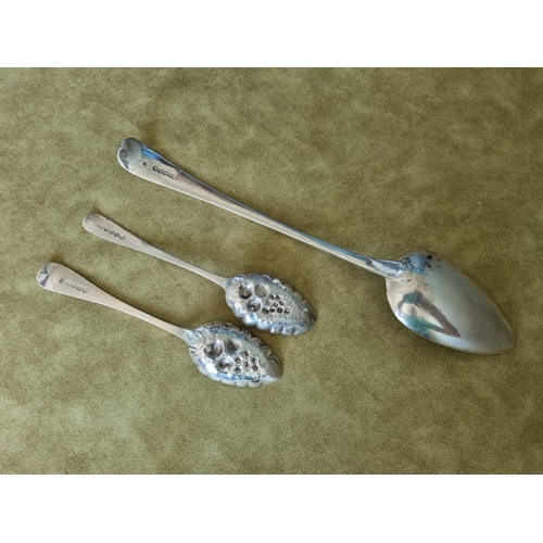 935 - A large Georgian basting Spoon, c1800 123 gms approx along with two Georgian berry Spoons c1821 Will... 