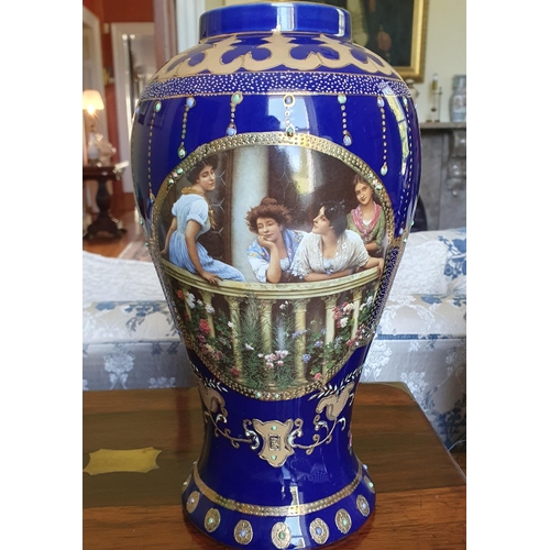 105A - A good pair of Blue ground Urns. H 37 cm approx.