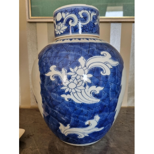 273 - A really good pair of early Oriental Ginger Jars with lids, on blue and ivory ground depicting a vas... 