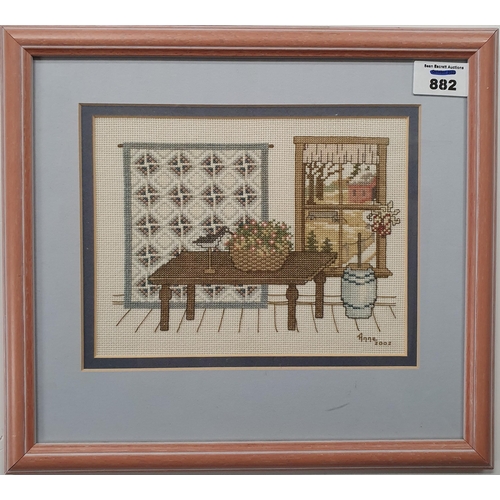 882 - A framed Tapestry .