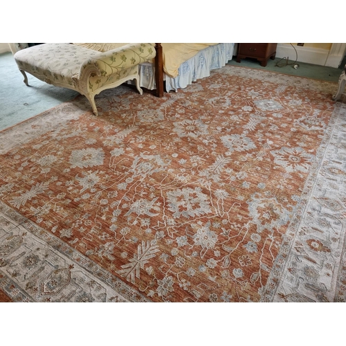 439 - A full pile Turkish Ziegler style Carpet with all over floral field in Terracotta and with a Cream b... 