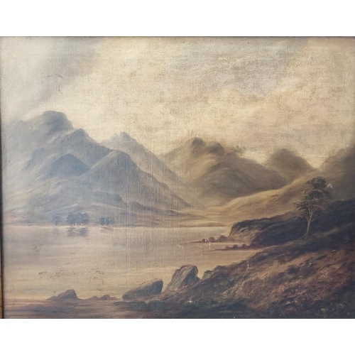 393 - A large Oil on Canvas of a mountainous landscape. No apparent signature. In a distressed frame.
60 x... 