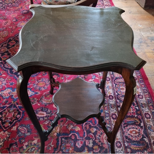 434 - An Edwardian Mahogany Centre Table with serpentine outline and gallery base. W48 x 48 x 171cm approx... 