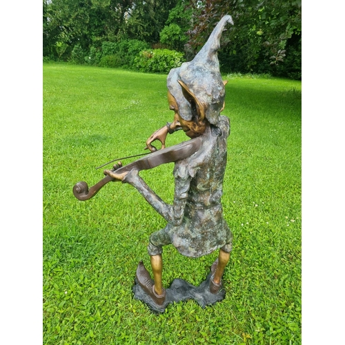 493 - A unusual Bronze figure of a Jester playing a Fiddle. H 101 x 54 W cm approx.