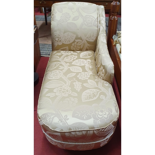 343 - A good modern Chaise Longue upholstered in gold and pink fabric.
H 82 x W 67 x L 164 cm approx.