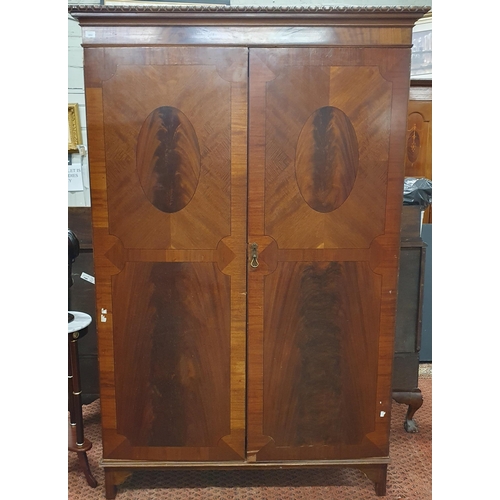 350 - An early 20th Century Mahogany two door Wardrobe the left door having a mirrored interior.
H 200 x W... 