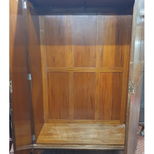 350 - An early 20th Century Mahogany two door Wardrobe the left door having a mirrored interior.
H 200 x W... 