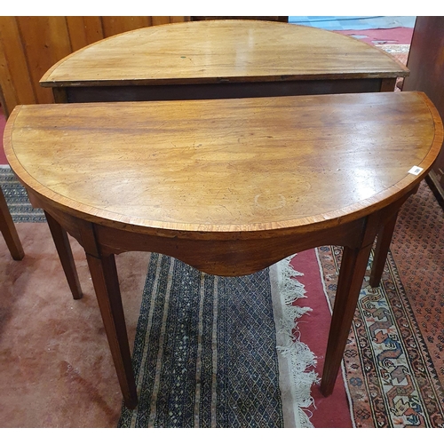 329 - A pair of Regency Mahogany Inlaid Veneered Side Tables with moulded tapered supports. (Originally pa... 