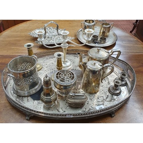 330 - A large quantity of Silver Plate to include Centrepieces, hotel ware coffee set, three silver napkin... 