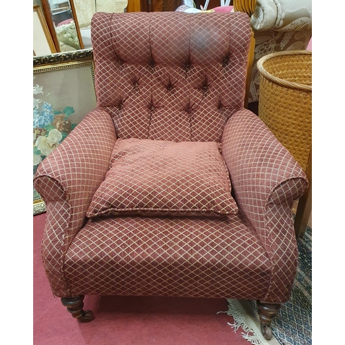 335 - A good Armchair with deep buttoned back upholstered in burgundy fabric with turned supports along wi... 