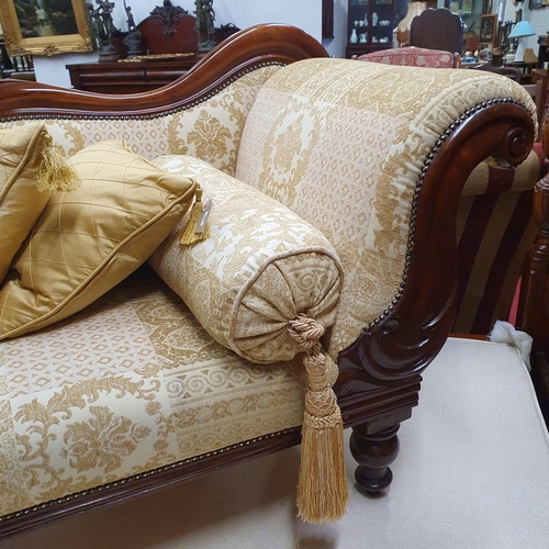 339 - A 19th Century Mahogany Chaise Longue with cream and gold patchwork style upholstery on turned suppo... 