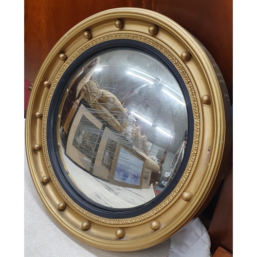 343A - A 20th Century Oak Stool with hunting tapestry top along with a convex mirror and three brass castor... 