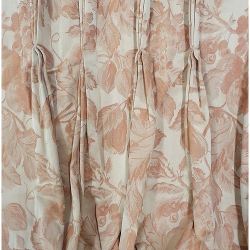 52 - A really good pair of cream ground Curtains with salmon floral design. W 110 x drop 240 cm approx.