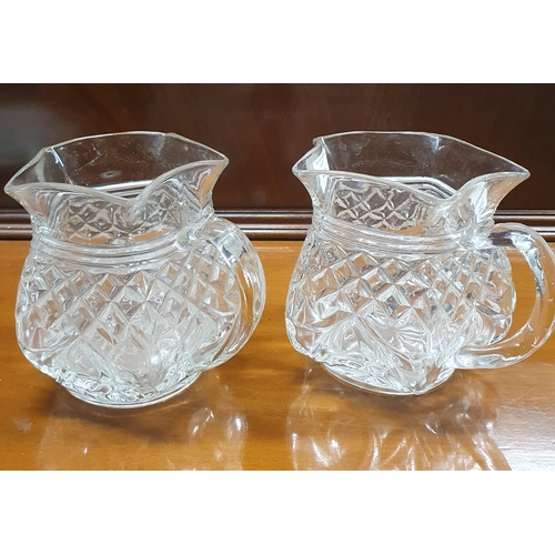 354 - A Cloisonne Pot, two glass water jugs and a vase.
H 11 x  D 6 cm approx.