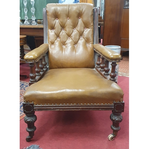 362 - A really good pair of 19th Century Mahogany Armchairs with deep buttoned backs on carved turned fron... 