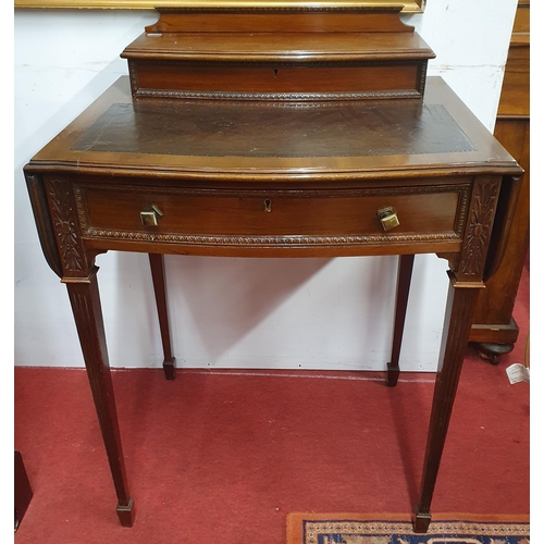 370 - An early 20th Century Ladies Desk of miniature proportions on square tapered fluted supports and gal... 