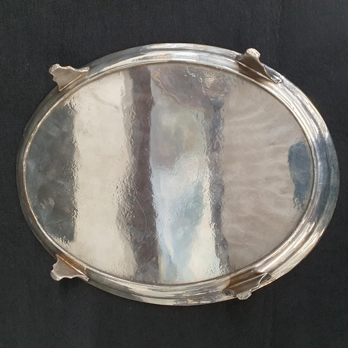 38 - A Regency oval Silver Plated Salver with bead edge, raised on four shell supports together with an a... 