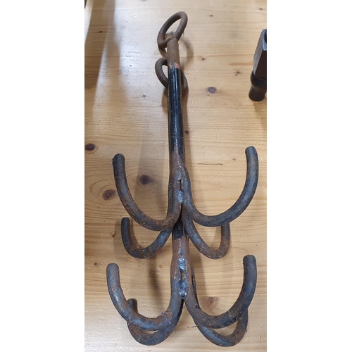 437 - Two vintage grapple Hooks, a Bin, Door Stop and other items.