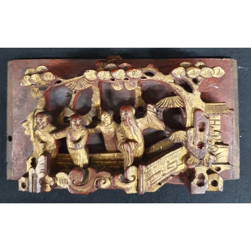 466 - A good set of four carved Chinese red laquered and parcel gilt wall Panels each with a group of stan... 