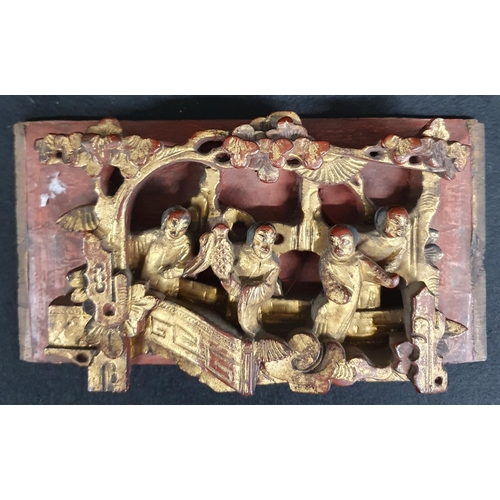 466 - A good set of four carved Chinese red laquered and parcel gilt wall Panels each with a group of stan... 