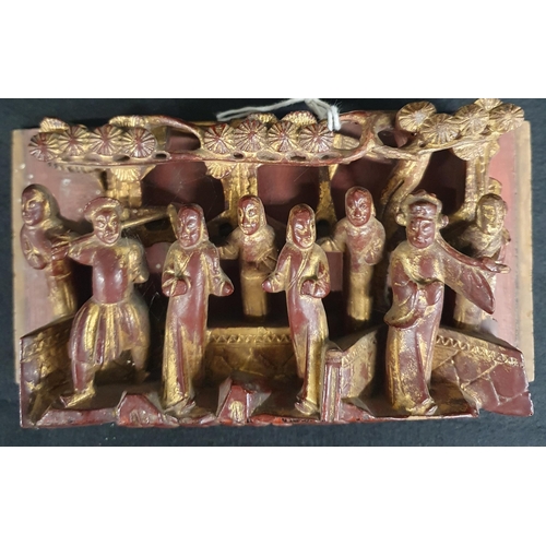 466 - A good set of four carved Chinese red laquered and parcel gilt wall Panels each with a group of stan... 