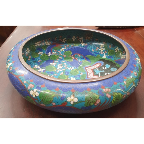 386 - A large Blue ground Oriental Cloisonne Bowl.
Diameter 30 cm approx.