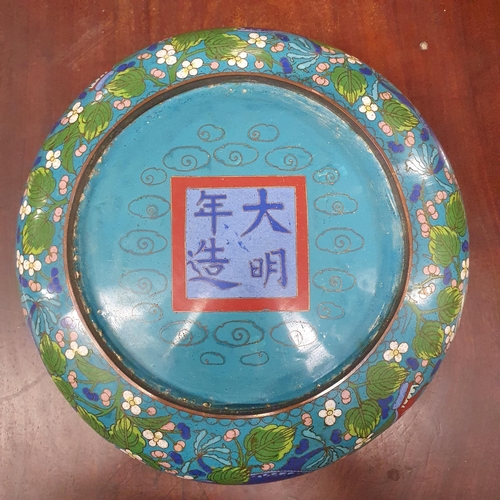 386 - A large Blue ground Oriental Cloisonne Bowl.
Diameter 30 cm approx.