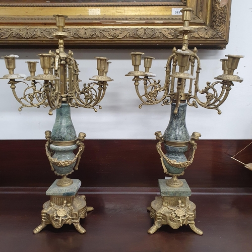 387 - A good pair of Brass Garnitures. Height 56 cm approx.