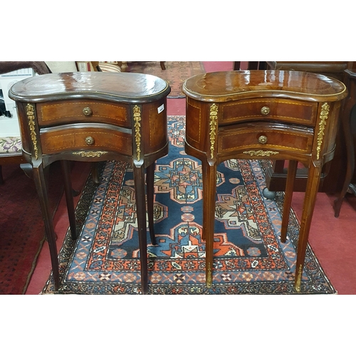 403 - A good pair of Walnut and burr Walnut kidney shaper continental side Tables with Omalu mounts. H 77 ... 